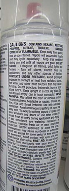 Back label of an art adhesive spray can.
